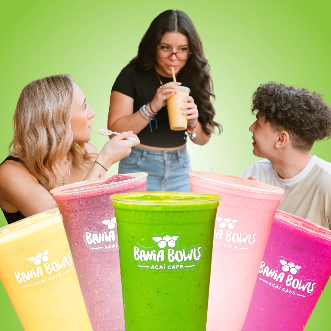 Customers enjoying fresh smoothies at Bahia Bowls locations across the U.S.